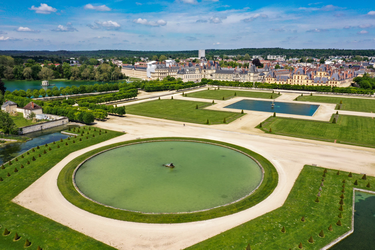 Aerial view of Chateau de Fontainebleau with its gardens, a UNESCO